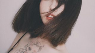 这纹身是猫还是狐狸啊？